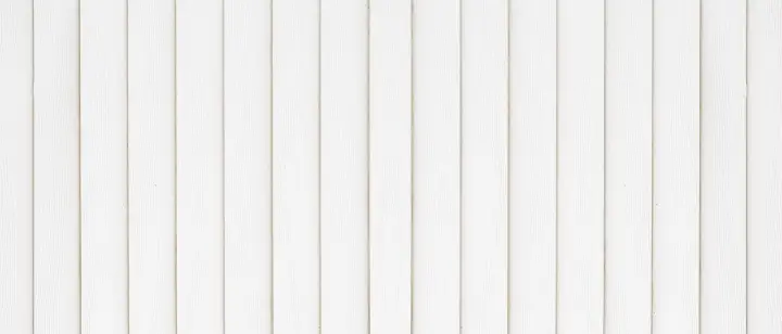 White vertical wood fence boards texture for modern residential fencing