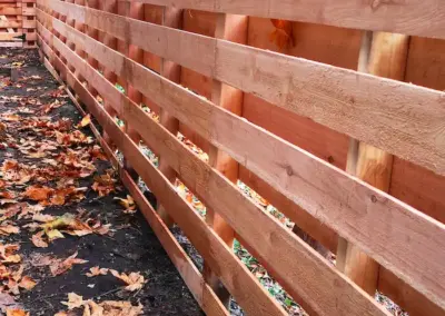 Horizontal wood fence installation in Seattle with modern privacy design