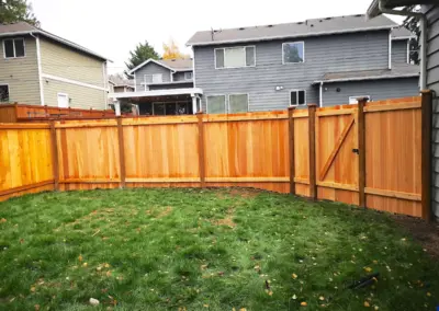 Wood privacy fence installation for a residential backyard in Seattle