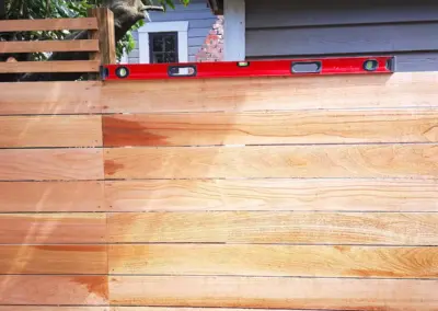Horizontal wood fence installation in Seattle