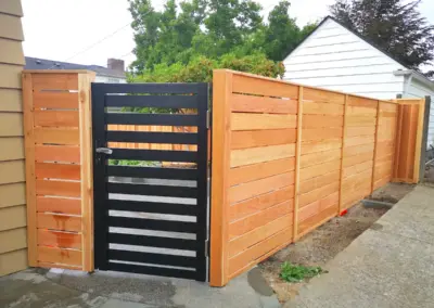 Horizontal wood fence installation in Seattle